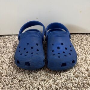 CROCS Blue Water Shoes with Perforated Design and Pivoting Heel Strap